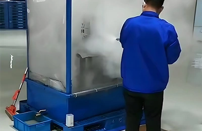 Steam cleaning the interior of industrial equipment