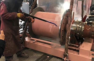 Steam cleaning of coated molds