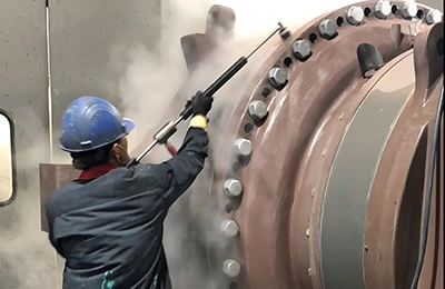 Steam cleaning of large industrial containers