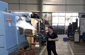 Steam cleaning industrial machine tools 